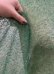 Picture of Mesh embroidery with green glass beads