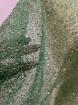Picture of Mesh embroidery with green glass beads