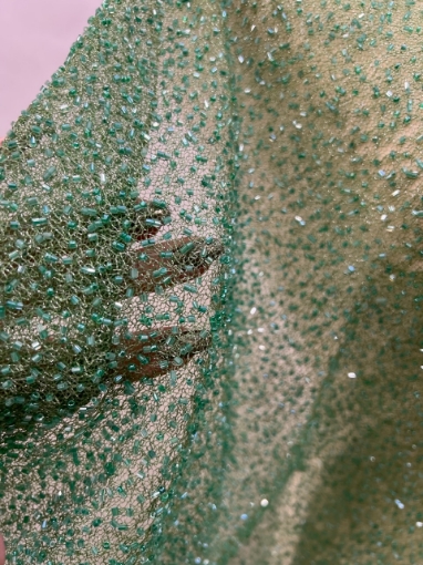 Picture of Mesh embroidery with green glass beads