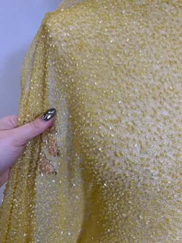 Picture of "Mesh-type embroidery with yellow glass beads"