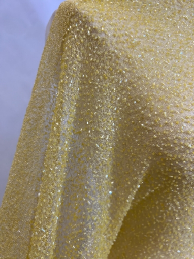 Picture of "Mesh-type embroidery with yellow glass beads"