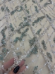 Picture of Embroidery in shades of aquamarine, silver, and white