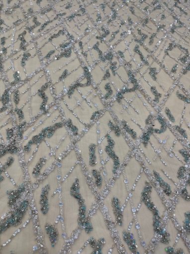 Picture of Embroidery in shades of aquamarine, silver, and white