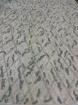 Picture of Embroidery in shades of aquamarine, silver, and white