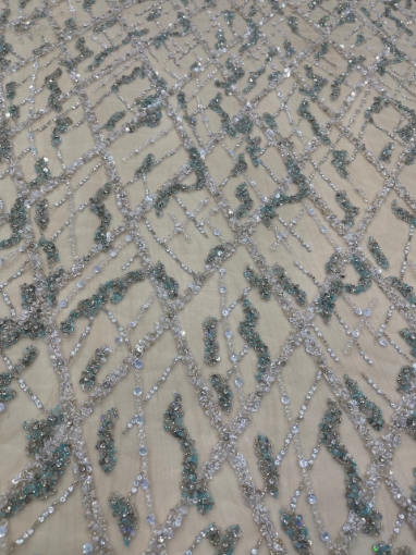 Picture of Embroidery in shades of aquamarine, silver, and white