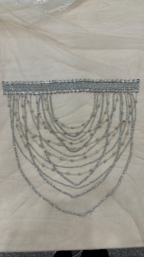 Picture of Handmade silver dress embellished with Crystals crystals.