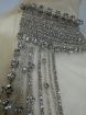 Picture of Handmade silver dress embellished with Crystals crystals.
