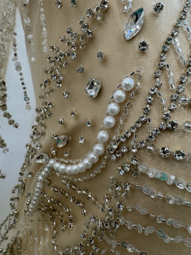 Picture of "Embroidery with crystals, pearls, and beads Champagne Rays"