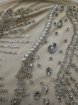 Picture of "Embroidery with crystals, pearls, and beads Champagne Rays"