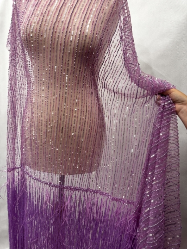 Picture of Lilac purple embroidery with fringes and feathers